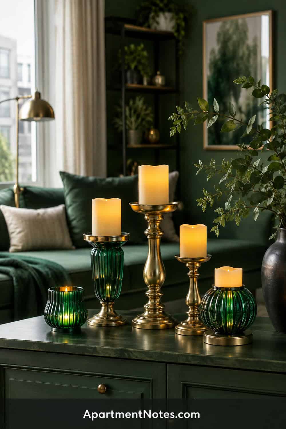 Vertical 2:3 Pinterest editorial image for small emerald green living room decor ideas: a composition centered on gold and green candle holders; use flameless LED light only, on a stable surface with generous clearanc...