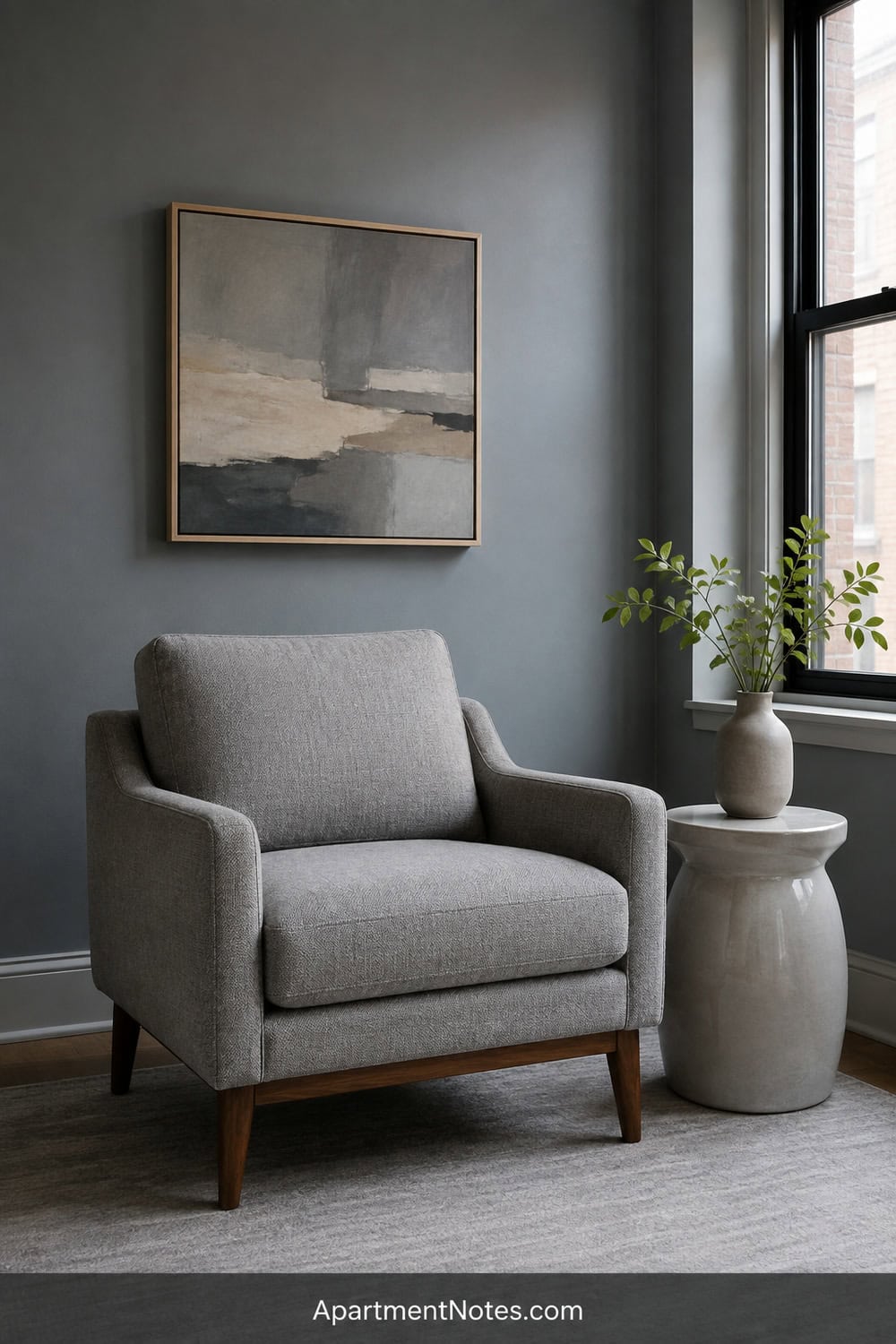 Vertical 2:3 Pinterest editorial image for small gray blue living room decor ideas: a composition centered on gray mid-century modern armchair; show a realistic, tidy apartment setting focused on the specific step. So...